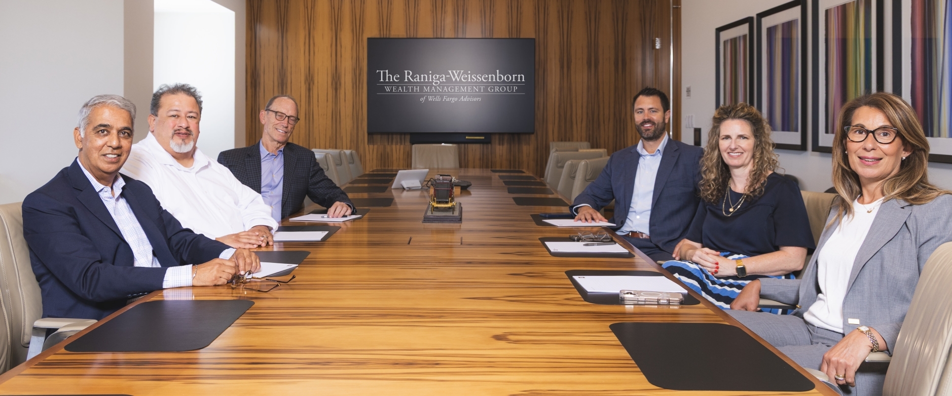 full team at conference table
